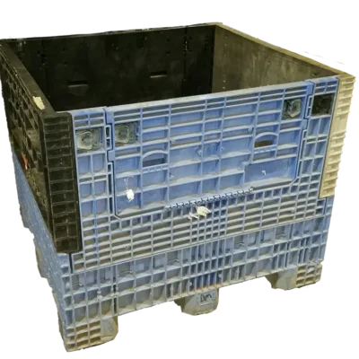 Reconditioned mixed‑color plastic bulk container with blue sides and black interior, shown open and empty.